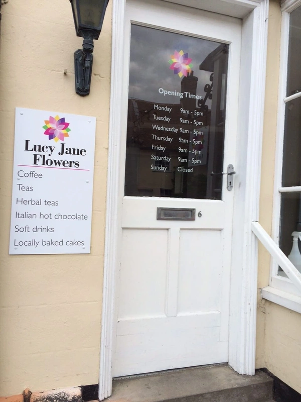  Cut Window Vinyl Graphics and? Printed Shop Signage - Part of a range of designed and supplied window cut vinyl graphics and shop sign board near Stowmarket
